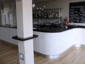 empty bar area with old bathroom 10
